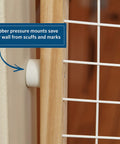 Close-up of rubber pressure mounts on Wooden Wire Mesh Pet Safety Gate Adjustable From 29 To 40.5 Inches Wide And 24 Inches Tall