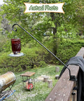 Rock Solid Heavy Duty Deck Rail Hook With 32 Inch Pole Hangs Planters Bird Feeders Lanterns And Wind Chimes Up To 15 Lbs No Sweat Install Totally Locked Down For Patios And Backyards showing feeder in garden.