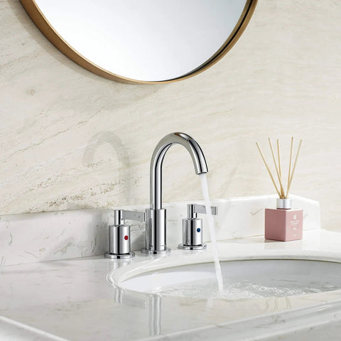 Brushed Gold 8 Inch Widespread Bathroom Faucet With Pop-Up Drain 3-Hole Setup High Arc Two-Handle Vanity Lavatory Brass 360 Degree Swivel Spout All-Metal Build Lead-Free Waterway Ceramic Cartridge cUPC NSF61 CEC Certified TAF830C-PB installed on a marble sink