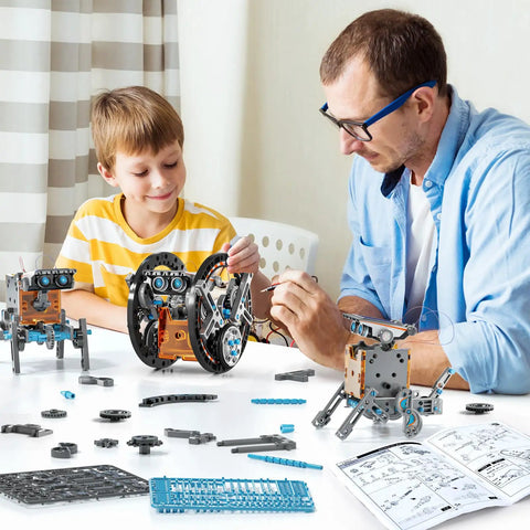 Father and son assembling robots from Solar Powered STEM Robotics Kit For Kids Aged 8 To 13 Build 12 Solar Robots Educational Science.