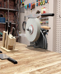 Hand Crank Kitchen Knife And Garden Tool Sharpener No Sweat Mount Quick Polish Grinder on workbench with knives