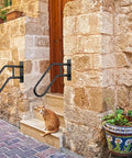 Solid As A Rock Matte Black Outdoor Handrail For One To Three Step Stairs Heavy Wall Mounted Grab Bar With Full Hardware Kit next to stone steps.