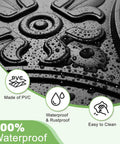 Close-up of black PVC ceiling tile with floral design, highlighting waterproof and rustproof qualities. Black 2x2 Drop Ceiling Tiles For Glue Up Install In Standard Fifteen Sixteenth Inch Grids Slick Classic Style Lightweight PVC Panels That Will Not Crack Water And Corrosion Resistant Easy Cut And Quick Install In T Bar Grids