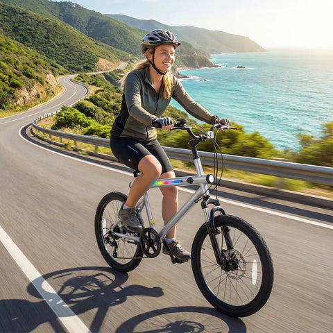 Rider on 20 Inch LED Lit Mountain Bike With Built In Stereo Speakers And Wireless Music, front suspension fork, colorful lights on frame