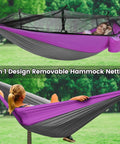 Person relaxing in a purple and gray All In One Camping Hammock With Mosquito Net Rain Fly Tarp And Straps, outdoor setting