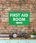 Left Arrow First Aid Room Outdoor Medical Safety Sign 8x12 Aluminum on brick wall above vintage decor