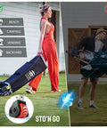 Two people carrying different bags, one lifting with ease using 10x10 Pop Up Canopy Tent With One Side Wall For Beach Parties Camping And Events Fast One Push Centerlok Setup No Tools Needed Durable Outdoor Sun Shade Gazebo Includes STO N Go Carry Bag Forest Green