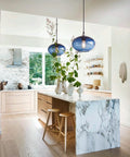 Pendant Lights Kitchen Island Hand Blown Glass UFO Ceiling Light Fixture with Seeded Bubbles above modern rustic kitchen.