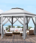 13x13 Pop Up Hexagonal Gazebo With Mesh Walls And Double Tiers No Fuss Setup Patio Shade Shelter for lawn garden backyard and deck weather resistant all season canopy tent in gray with furniture inside.
