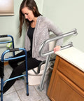 Real Deal Brushed Nickel Toilet Support Rail With Rock Solid Non Slip Grip For Seniors And Bath Safety 24 Inch wall mounted beside toilet.