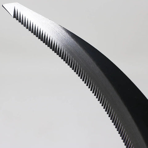 Close-up of serrated blade of Go-To 6.7 Inch Japanese Serrated Garden Sickle With Razor Sharp Carbon Steel Blade For Harvesting And Weeding Made In Japan