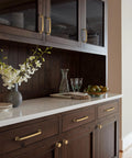 Champagne Bronze Surpass Cabinet Pull Five And One Sixteenth Inch Center To Center on dark wood kitchen cabinets