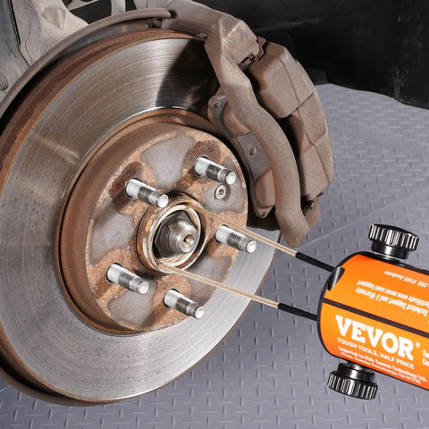 Magnetic Induction Heater Kit, 1000W 110V Portable Handheld Tool, in use on rusted wheel bolts, no flame bolt remover shown