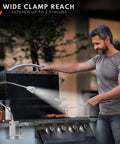 Man grilling under Super Bright Magnetic BBQ Grill Light With 360 Degree Gooseneck Weather Resistant Task Lighting For Outdoor Grilling