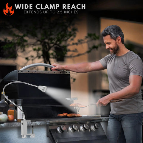 Man grilling under Super Bright Magnetic BBQ Grill Light With 360 Degree Gooseneck Weather Resistant Task Lighting For Outdoor Grilling