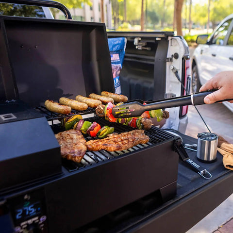 Cooking meats and vegetables on a Table Top Wood Pellet Grill With Flame Broiler For Direct Searing Up To 1000°F, 7 Lb Hopper