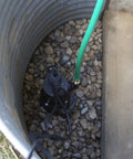 iSwitch Auto On-Off Submersible Pump, 0.25 HP, Reinforced Thermoplastic, for hands-free water removal installed in a gravel sump pit
