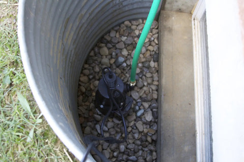iSwitch Auto On-Off Submersible Pump, 0.25 HP, Reinforced Thermoplastic, for hands-free water removal installed in a gravel sump pit