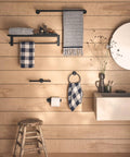 24 Inch Wide Matte Black Towel Storage Shelf With Towel Bar Modern Hotel Style Bathroom Organizer For Towels On Wood Wall