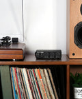 Beast 300W Per Channel Class D Stereo Amplifier For Home Theater And Studio Monitors With Phono Input between turntable and speaker.