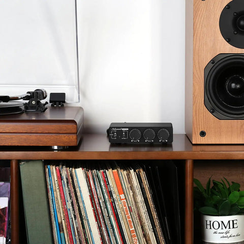 Beast 300W Per Channel Class D Stereo Amplifier For Home Theater And Studio Monitors With Phono Input between turntable and speaker.