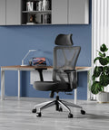 Ergonomic Mesh Office Chair With High Back, Adjustable Lumbar Support, Headrest And 3D Armrests at a modern desk.