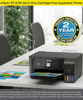 GameChanging Wireless Color All In One Supertank Printer Featuring Built In Scanner Copier And HassleFree Setup For Streamlined Daily Home Office Productivity on a desk with printed documents.