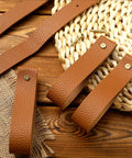 8 Piece Hella Durable Premium Leather Wall Hooks With Solid Brass Screws For Heavy Duty Curtain Hanging And Super Slick Bathroom Storage Essentials, brown leather straps with copper screws.