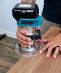 Top Shelf 6 Inch Round Router Base Plate For Makita Rt0701c And Xtr01z Compacts with a router in use on wood.