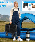 Woman holding Foldable Collapsible Wagon Cart With Wheels That Holds Up To 360 Lbs Ready To Roll For Grocery Runs Camping Beach Trips Shopping Garden And Sports Heavy Duty 600D Oxford Fabric With PVC Coating