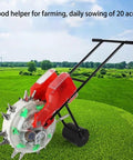 Do It All Garden Seeder With Clear Seed Box And Adjustable Spacing For Corn Peanuts Soybeans And Fertilizer Spreader in field