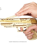 Wolf 01 Handgun 3D Wooden Puzzle Kit For Adults With Mechanical Moving Parts And Realistic Wood Model Gun Brain Teaser And Hobby Set Quick 60 To 90 Minute Assembly No Glue Needed Great Gift For DIYers, wood handgun in hand