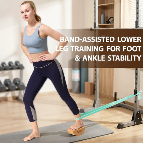 Reversible Half Moon Cork Yoga Block Pair Solid Game Changer Balance Trainer For Steady Moves And Epic Wobble Vibes Natural Cork Build being used in band-assisted leg training.