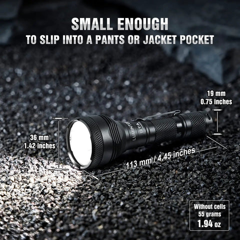 Pocket Thrower GTA LED Flashlight That Hits Hard With Ultra Long Throw, compact design resting on gravel surface