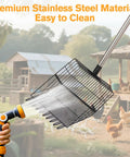 Beefy Heavy Duty Chicken Poop Scooper With Adjustable Long Handle And Stainless Steel Sifter Shovel being cleaned with a hose