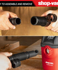 Person connecting Beefy 4 Ft Vacuum Hose 1-1/4 Inch Diameter For Wet Dry Vacuums to a shop vac unit