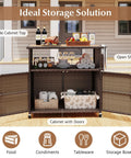 Sturdy outdoor storage cabinet on wheels with solid acacia wood and PE rattan, open shelves with food and drinks setup.