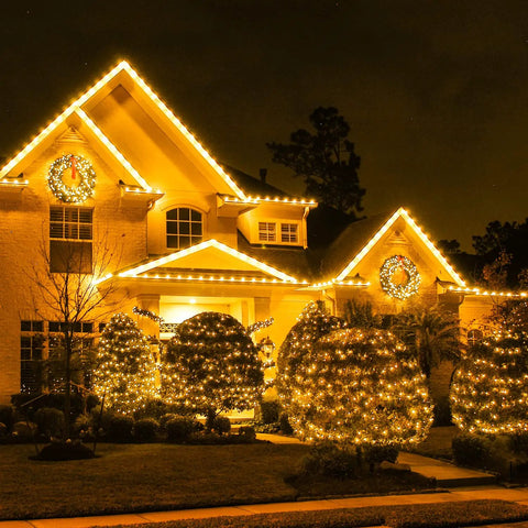 House decorated with 1000 LED Warm White Christmas String Lights With Remote, Epic 272 Feet Total Length, 8 Modes, Plug In Indoor Outdoor Decor