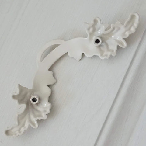 2.5 Inch Center To Center Shabby Chic Pull Handle Cream White With Gold Accent For Dresser Drawer Kitchen Cabinet Zinc Alloy Furniture Hardware 64 mm Hole Spacing Home Renovation Upgrade on a light surface.