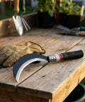 Two Piece Hand Sickle Garden Tool Set No Nonsense Heavy Duty Manganese Steel Weed Cutter on wooden table