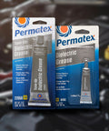 Two Permatex dielectric grease tubes in blue packaging for automotive electrical connections (3 oz and 0.33 oz).