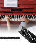 Six Pack Rock Solid Black Piano Hinges 18 Inch Heavy Duty Continuous Barrel Hinges For Cabinets next to piano keys.