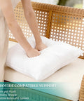 Person pressing 12x20 Outdoor Pillow Inserts Pack Of 2 Waterproof Square Throw Pillows For Couch Sofa Bed And Patio Furniture Decorative Cushion Fillers White Outdoor Comfort For Your Deck And Patio Cozy Vibe