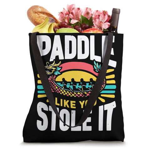 Paddler Tote Bag For Dragon Boat Racing And Dragonboating Fans Built For Busy Crews And Festival Fun It Holds Gear Paddles And Personal Essentials With Easy Access Comfort And Everyday Durability displaying 'Paddle Like You Stole It' design filled with groceries.