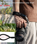 Person using Quick Release Soft Neoprene Camera Hand Wrist Grip Strap For Lightweight DSLRs And Mirrorless Cameras