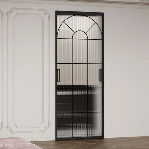 Hardcore Interior Sliding Barn Door Featuring Textured Reeded Glass Panels And Matte Black Frame Hidden Wall Track Kit Saves Wall Space And Moves Like Butter In Any Room Setup, front view.