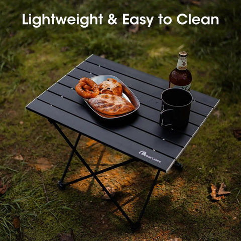 Ultralight Folding Camping Table With Carry Bag Portable For Outdoor Cooking And Picnics Camp Boat And Travel Black Small Size on grass