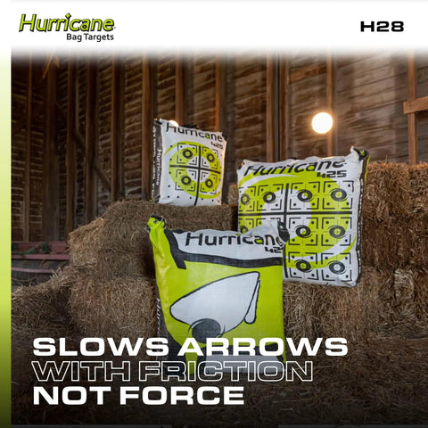 Two Sided Archery Bag Target Built For 425 FPS Practice with bright aiming points on hay bales in rustic barn setting.