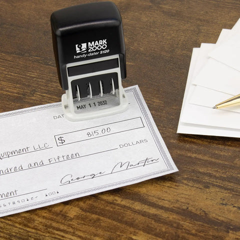 Slick S120 Self Inking Date Stamp With Black Ink And Half Inch Impression Size featuring date imprint on a check.