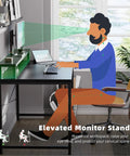 Man using 47 Inch Small Computer Desk With Monitor Stand And Headphone Hook Space Saving Home Office Desk For Gaming Study